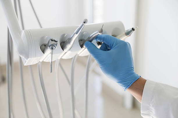 Professional Root Canal Treatment technician working in Abbotsford, WI